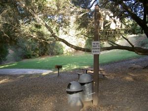 Hans Christian Andersen Park Atterdag Bowl with trash receptacles and picnic table.